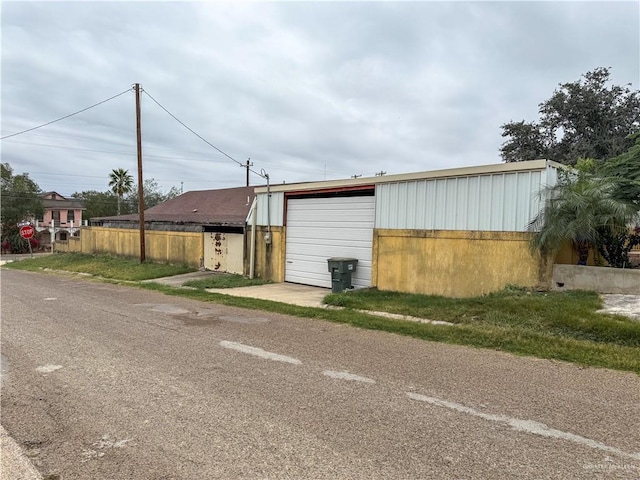 exterior space with a garage