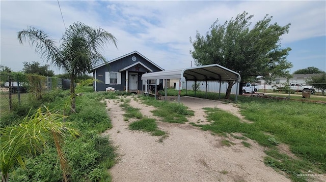 2313 E Walker Rd, Donna, TX 78537 - view of front of property with driveway and a carport
