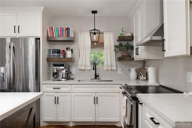 kitchen featuring stainless steel appliances, white cabinets, a sink, and open shelves