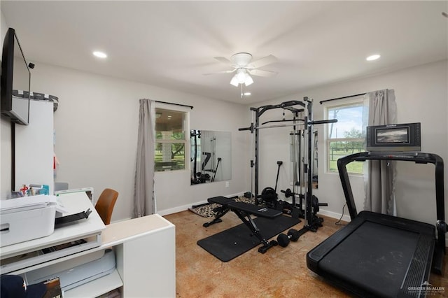 exercise room with baseboards, a ceiling fan, and recessed lighting