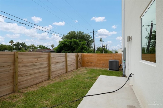 1204 N Lincoln Ave, San Juan, TX 78589 - view of yard featuring central AC unit and a patio
