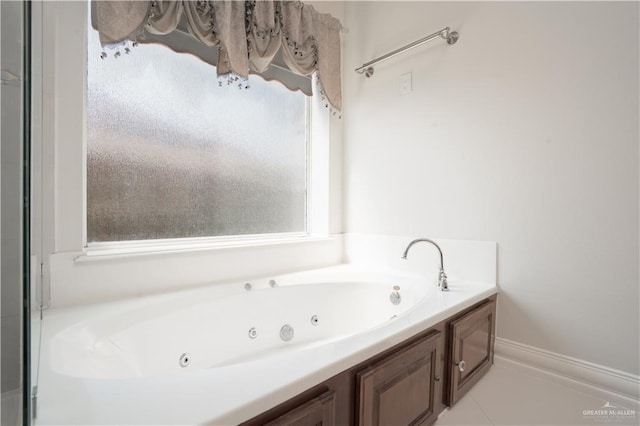 2405 San Alejandro St, Mission, TX 78572 - full bathroom featuring a tub with jets