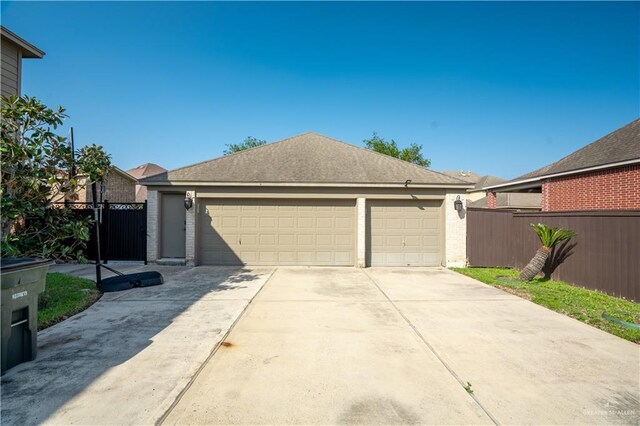 2405 San Alejandro St, Mission, TX 78572 - garage with concrete driveway