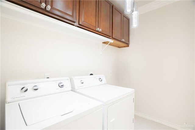 2405 San Alejandro St, Mission, TX 78572 - laundry room featuring cabinet space, washer and dryer, and baseboards
