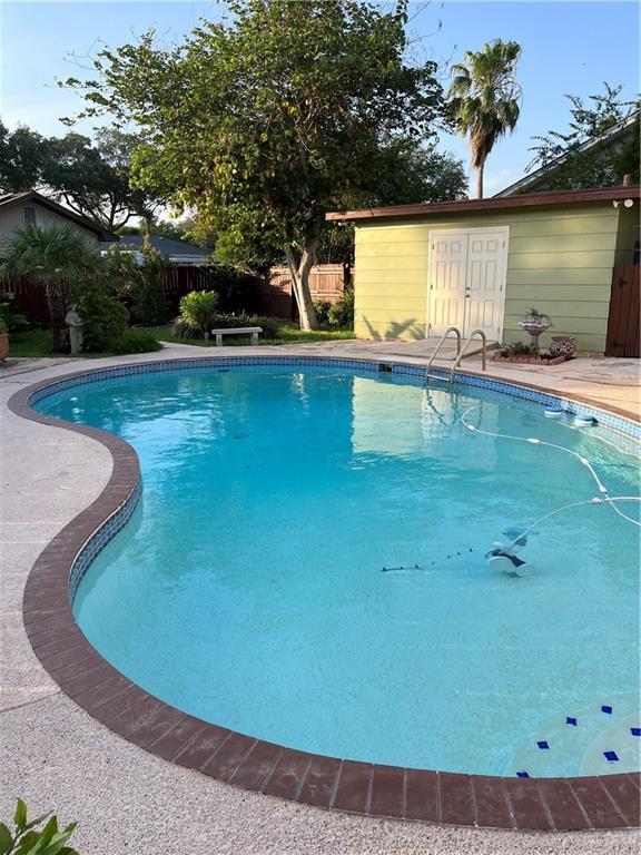 view of swimming pool featuring a fenced in pool and a fenced backyard