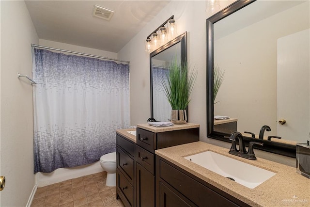 full bath with shower / bath combo, visible vents, vanity, and toilet