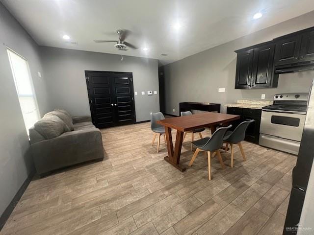 dining space with light wood-style floors, recessed lighting, ceiling fan, and baseboards