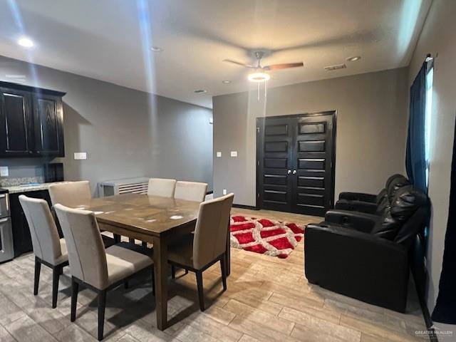 dining room featuring recessed lighting, ceiling fan, and light wood-style flooring