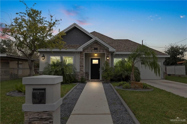 view of front of home with a lawn