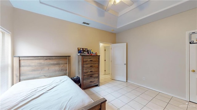 3810 W Sarah Evans St, Edinburg, TX 78541 - bedroom with ceiling fan, a raised ceiling, baseboards, light tile patterned floors, and visible vents