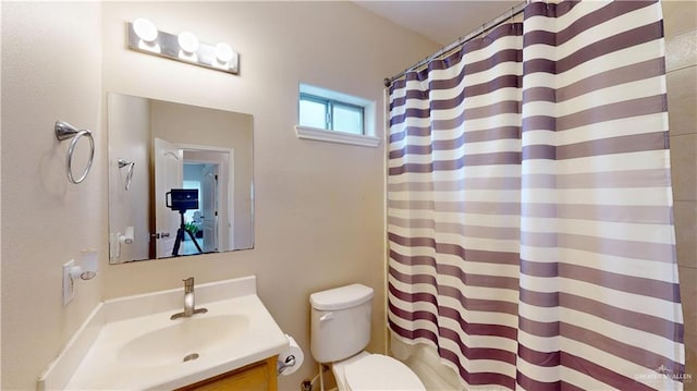 3810 W Sarah Evans St, Edinburg, TX 78541 - bathroom featuring toilet, a shower with curtain, and vanity