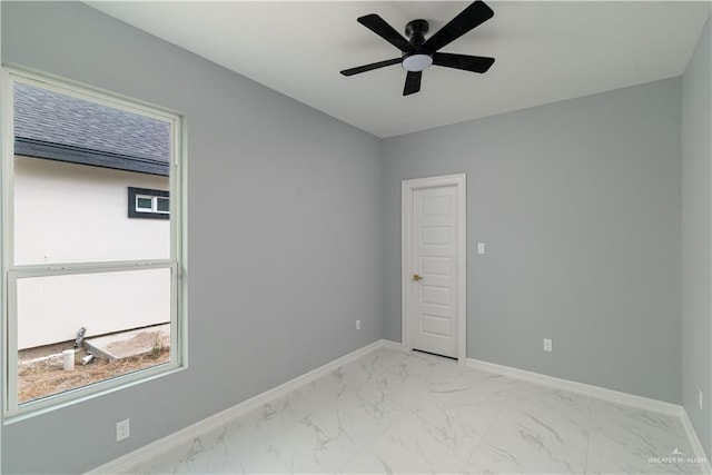 empty room featuring ceiling fan