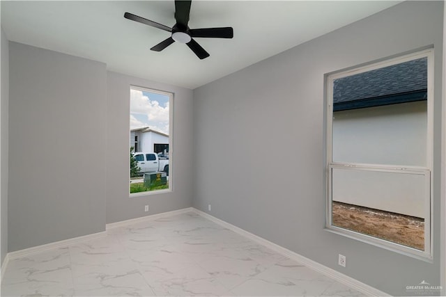 empty room featuring ceiling fan