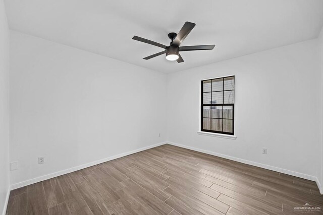1315 Rio Guadalupe Cir, San Juan, TX 78589 - empty room with wood finished floors, ceiling fan, and baseboards