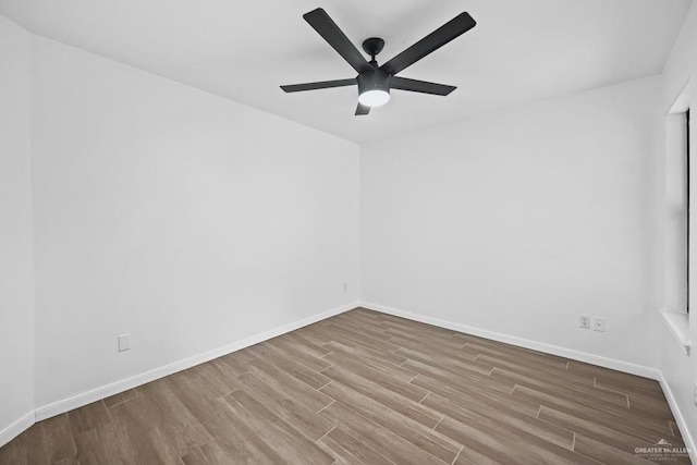 1315 Rio Guadalupe Cir, San Juan, TX 78589 - unfurnished room with wood finished floors, ceiling fan, and baseboards