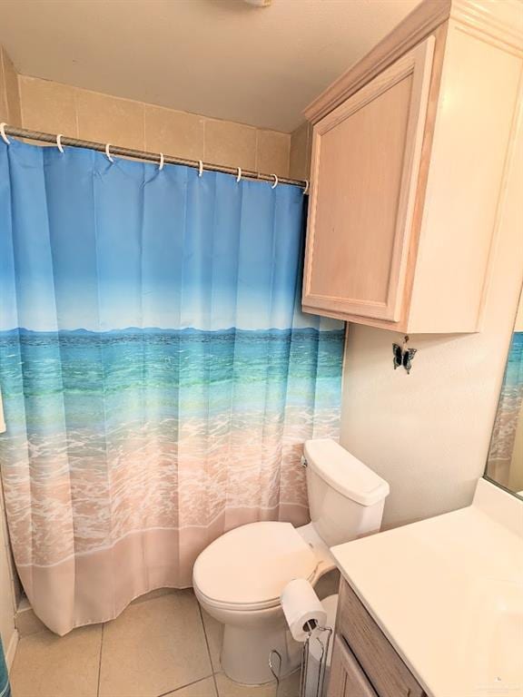 109 E Retama St Unit 2, South Padre Island, TX 78597 - bathroom with tile patterned floors, toilet, vanity, and a shower with curtain