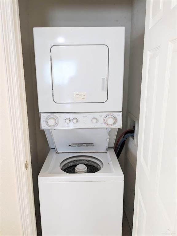 109 E Retama St Unit 2, South Padre Island, TX 78597 - laundry area featuring stacked washer and clothes dryer