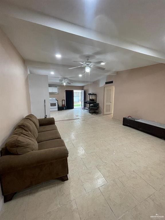 living room featuring ceiling fan and a wall mounted air conditioner