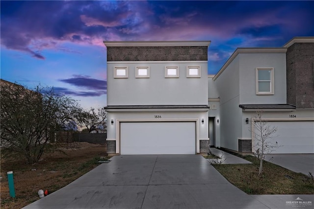 view of front of home with a garage