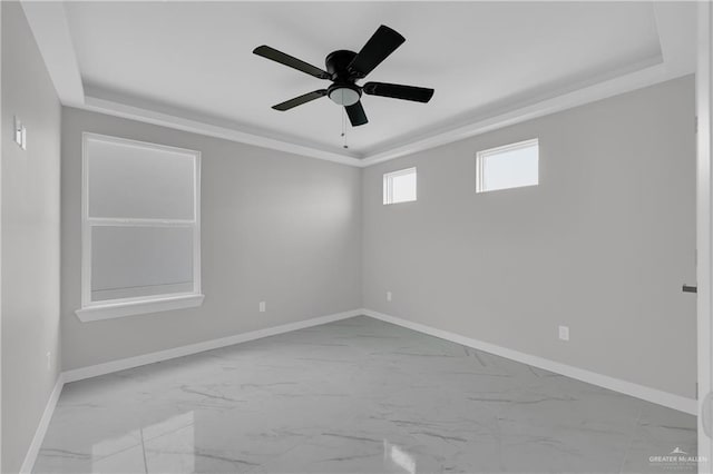 empty room with crown molding and ceiling fan