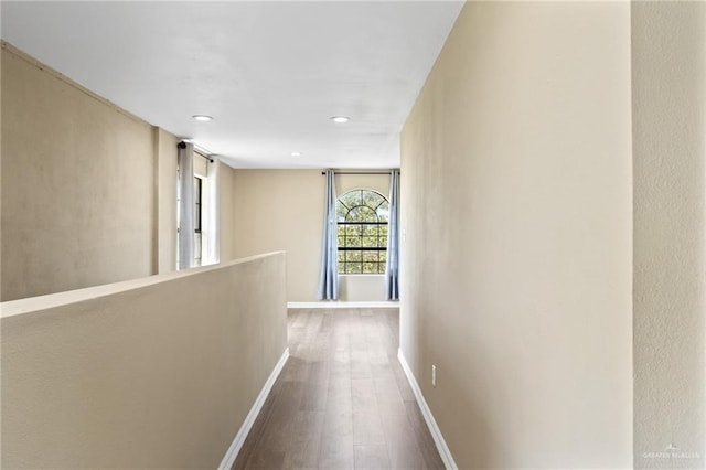 8006 Senecio St, Mission, TX 78574 - hall featuring dark wood-style floors and recessed lighting