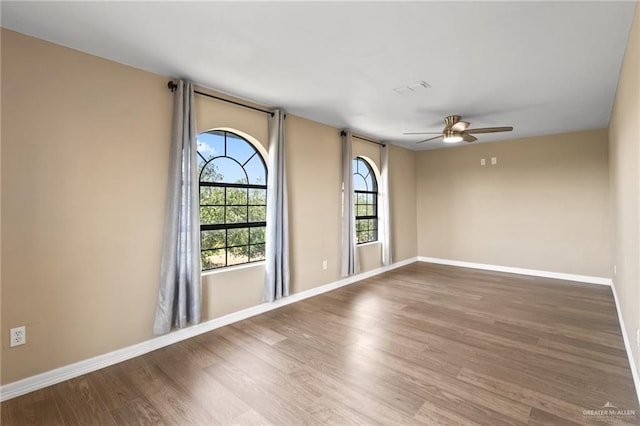 8006 Senecio St, Mission, TX 78574 - spare room with ceiling fan and wood finished floors