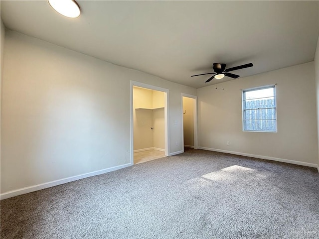 603 Witmer St, Weslaco, TX 78596 - unfurnished bedroom with carpet flooring, baseboards, and a ceiling fan