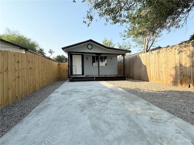 603 Witmer St, Weslaco, TX 78596 - view of outbuilding with a fenced backyard and covered porch