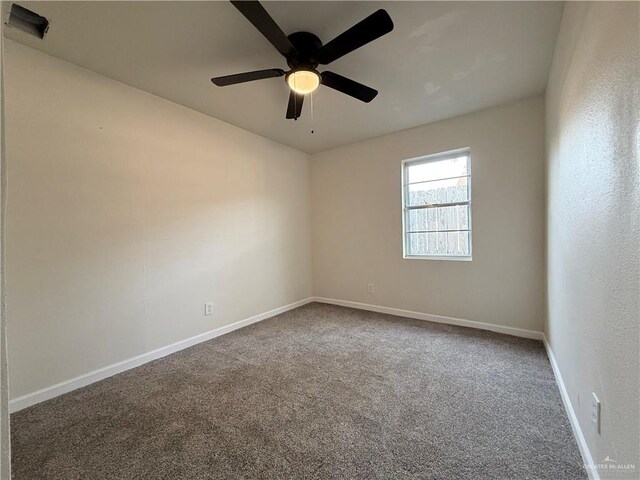 603 Witmer St, Weslaco, TX 78596 - carpeted empty room with baseboards and a ceiling fan