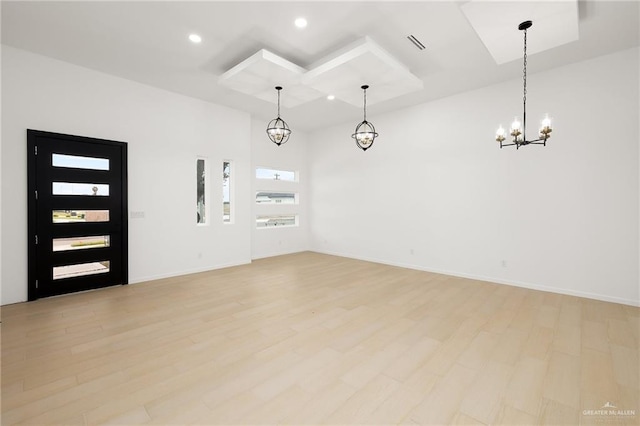 spare room with light wood-type flooring