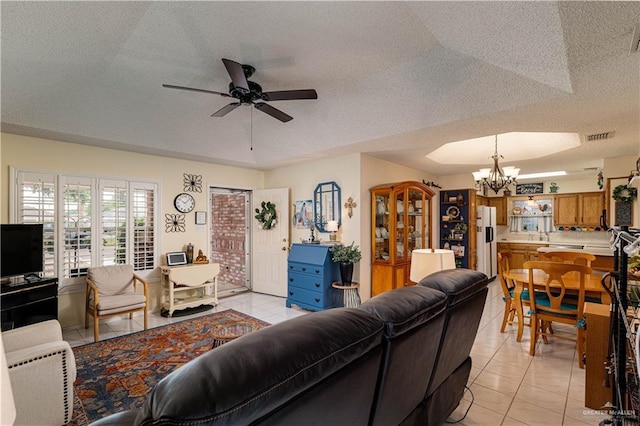 512 Mercury St, Mission, TX 78572 - living room with light tile patterned floors, a chandelier, ceiling fan, and a textured ceiling