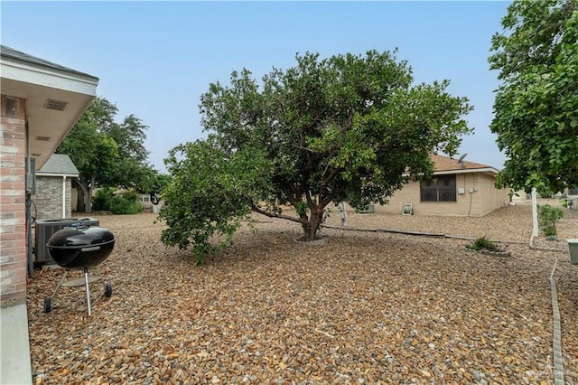 512 Mercury St, Mission, TX 78572 - view of yard featuring central AC