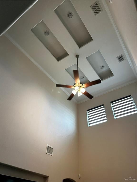 details featuring ceiling fan and ornamental molding