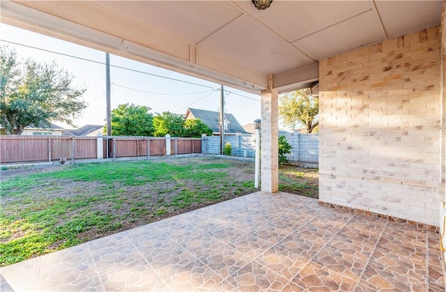 view of patio with a fenced backyard