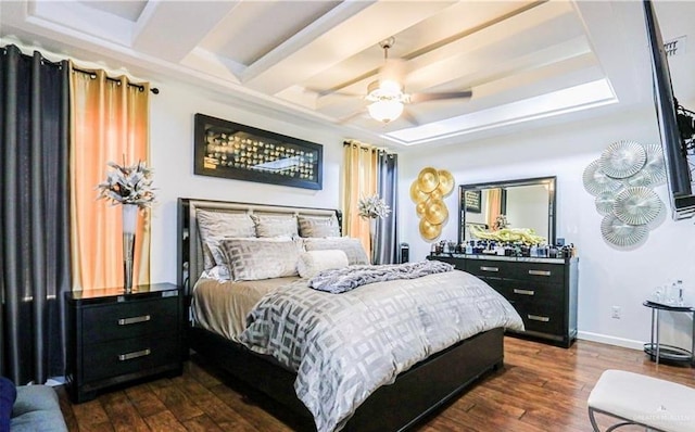 bedroom with ceiling fan and dark hardwood / wood-style flooring