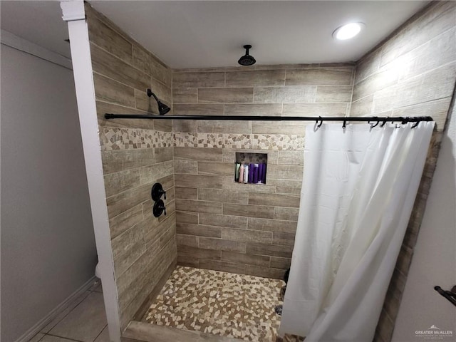 bathroom featuring tile patterned flooring and a shower with shower curtain