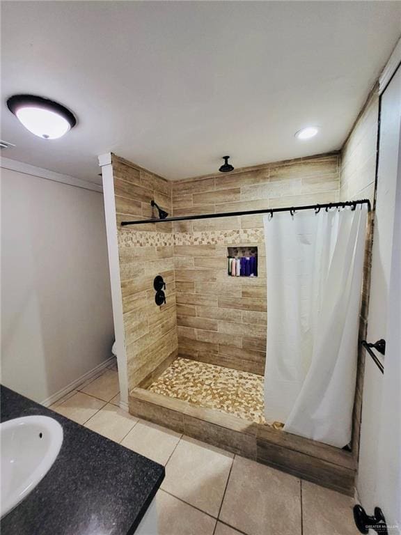 bathroom with a shower with curtain, tile patterned flooring, vanity, and ornamental molding