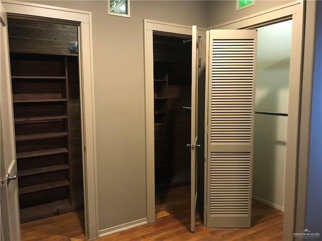 1316 W Maple Ave, Mcallen, TX 78501 - hallway with wood finished floors