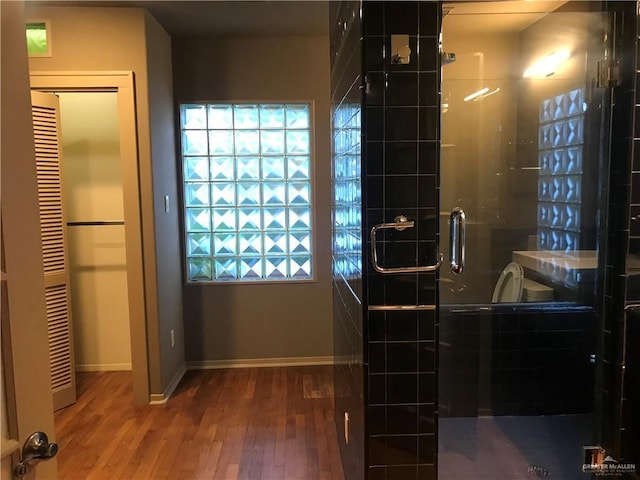 1316 W Maple Ave, Mcallen, TX 78501 - bathroom with wood finished floors and a shower stall