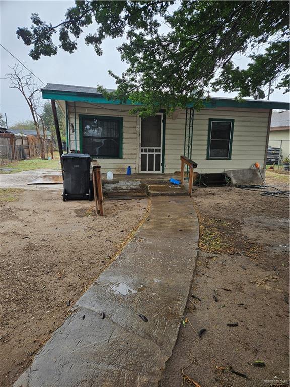 view of front of house with fence