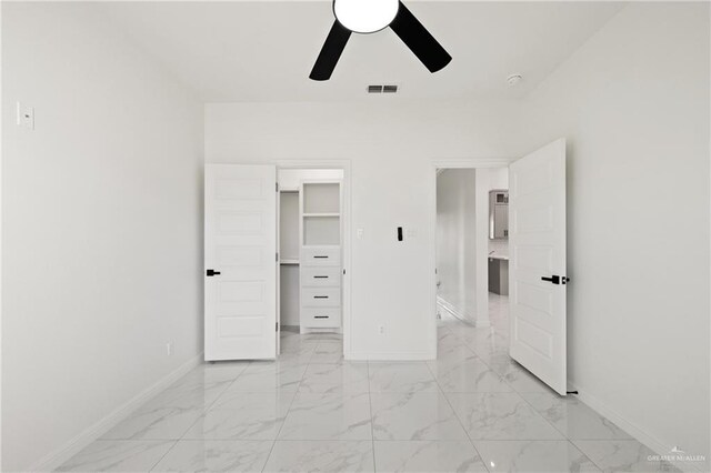 bathroom featuring a wealth of natural light, an enclosed shower, and vanity