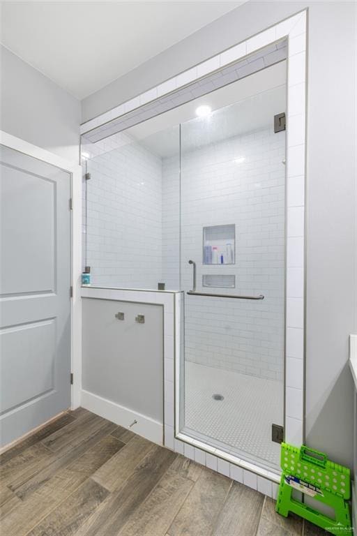 washroom with dark wood-type flooring