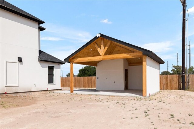 view of property's community with a patio