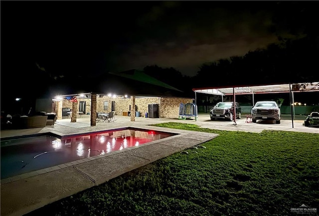 6101 Mile 7 Rd, Mission, TX 78573 - pool at twilight with a yard