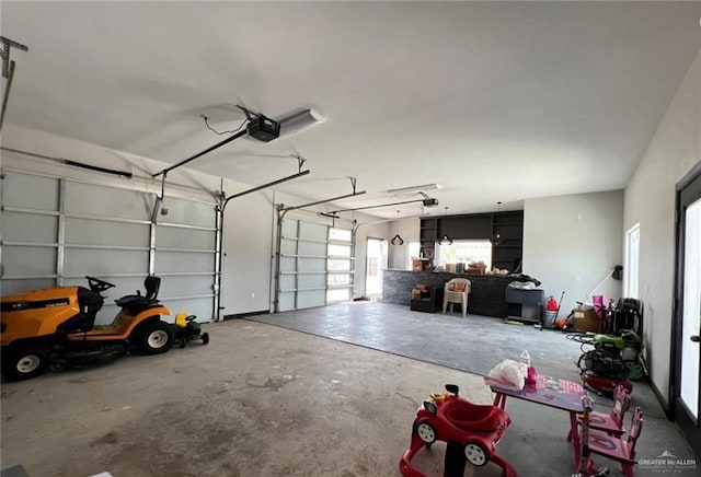 garage featuring a garage door opener