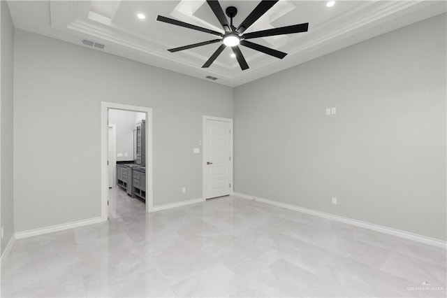 528 Candela St, Edinburg, TX 78542 - unfurnished bedroom featuring baseboards, a high ceiling, visible vents, and a raised ceiling
