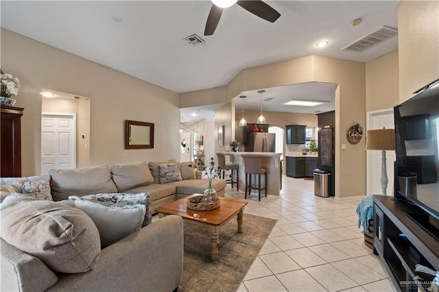 1602 Meadow Ln, Harlingen, TX 78550 - living room featuring light tile patterned flooring and a ceiling fan