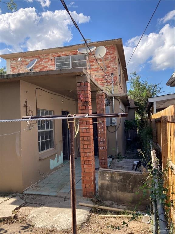 back of house featuring a patio area