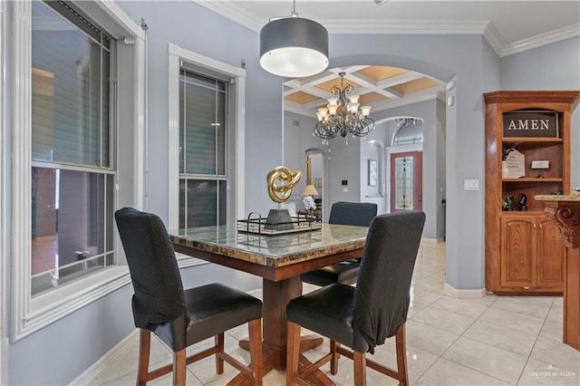 dining area with arched walkways, baseboards, crown molding, and coffered ceiling