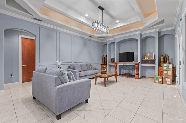 living area with a decorative wall, ornamental molding, recessed lighting, and arched walkways